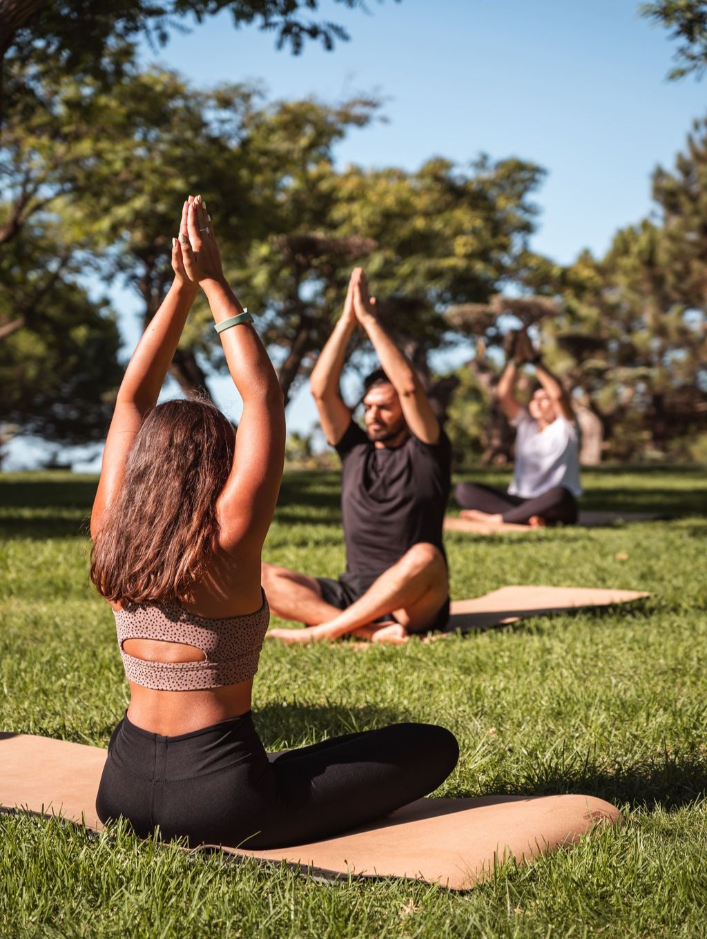 Group yoga class outside the Kimpton Atlantico Algarve 