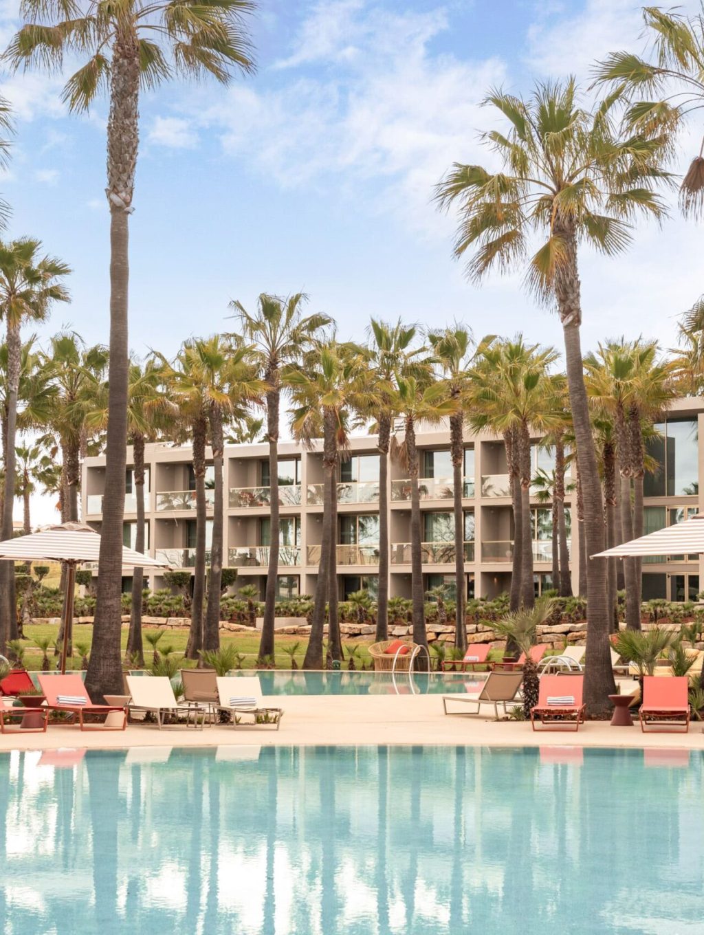 Outdoor pool area at the Kimpton Atlantico Algarve 