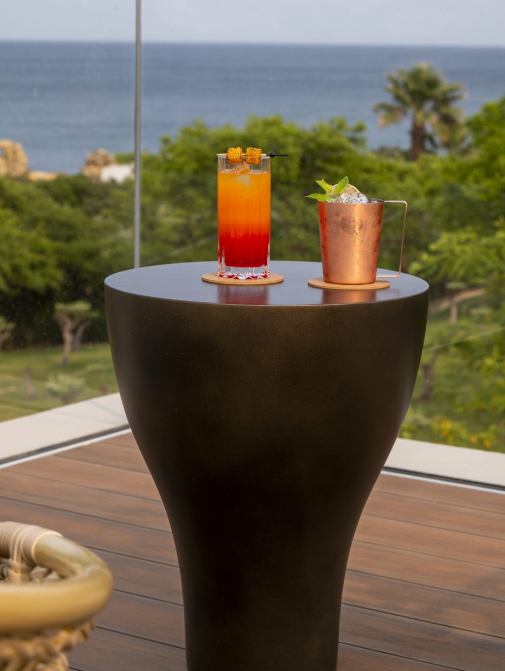 cocktail with ocean view at zenite fooftop bar in albufeira
